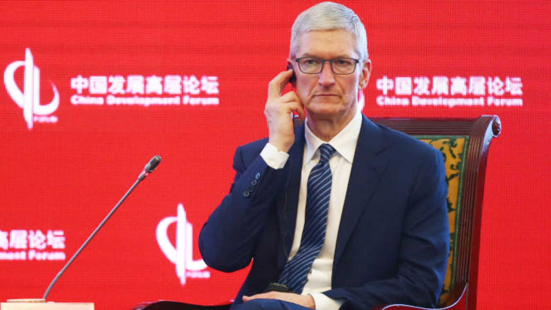 China says it hasn’t banned iPhones or international devices for authorities group