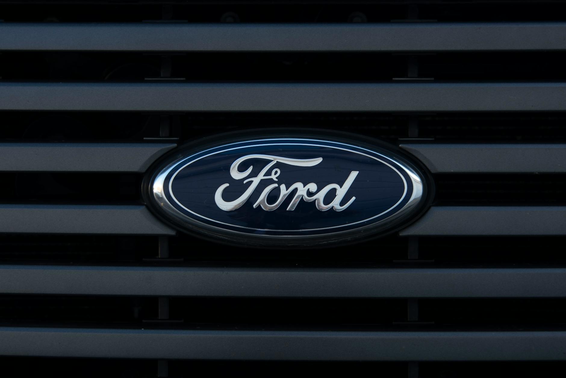 black and silver ford logo